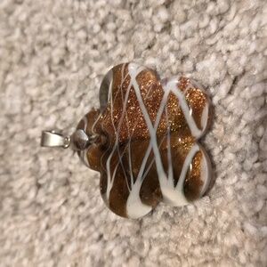 Brown and white glitter flower pendant